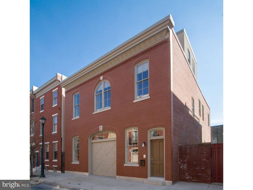 Truly one-of-a-kind, this property is a conversion of a historical carriage house on one of the most prestigious blocks of the Art Museum area. The original carriage house was completed circa 1886, and is fully detached, an amazing 34ft wide. No expense was spared in renovating this into the most unique home in the city, soaring 12 foot ceilings and vast, spacious rooms and parking for 3 vehicles. Top of the line systems: from the video intercom and security systems, built-in surround sound that stretches throughout every room, smart lighting that can be dimmed to your specifications with one touch, dual-zone HVAC & a central vacuum system. The 1st Fl..open floor plan, with a tremendous cook's kitchen: highlights include granite counters, custom cabinets, S/S appliances of the highest quality, a wine refrigerator, center island with sink & stainless pendant lights. Dining room with antique chandelier. In the living room, a gas fireplace serves as the centerpiece for a custom built-in entertainment system. Throughout, you can find stunning wide-plank floors of prefinished oak and huge, wide custom wood windows. A half bath and a deep coat closet on this floor, and an exterior door to a private slate rear patio with abundant garden planters and a high wall for unmatched privacy. 2nd fl.. boasts suite-style bedrooms with custom closets and brilliantly designed bathrooms with rainfall showers, marble vanities and a designer color scheme. The 2nd fl hallway features a hanging antique metal chandelier. The stunning master bedroom has a gas fireplace surrounded by woven glass tile & copper trim, doors to a lovely Juliet balcony overlooking the patio/garden and very spacious his & hers walk-in closets. The en-suite bathroom has a free-standing porcelain tub & also a luxurious rainfall shower featuring spray massage modes, fully enclosed in beautiful glass. The floor is designer marble tile with an inlaid sparkling gem motif, a marble vanity with his and hers sinks. 3rd fl..wet bar with wine refrigerator and access to a large trex deck with a breathtaking views of Center City. Pull right into a garage at the front of the home...with 2 additional parking spaces located at the rear adjoining patio. All parking is secured & operated by remote control. Superior workmanship and materials throughout!! 8 years remaining on the tax abatement.