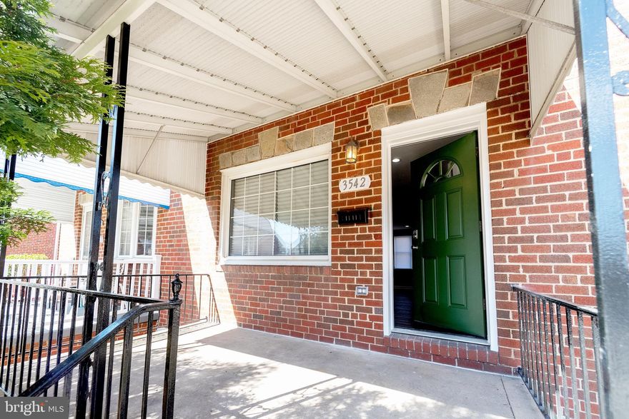 Absolutely beautiful  and tasteful renovation.  You will love all of the natural light that pours into this home.  This end unit features an open floor plan, finished basement, recessed lighting, new roof, new windows, designer back splash and granite counter tops!  The yard is so spacious and the front porch is a nice retreat.