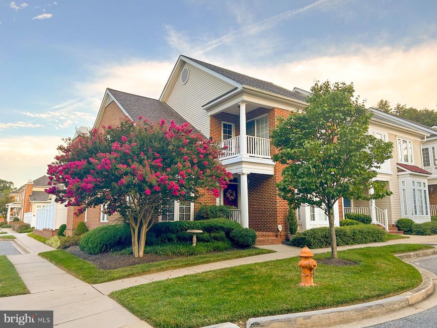 Welcome to this exceptional residence on a spacious corner lot, offering a private bluestone courtyard and a mature landscape package for serene outdoor living. The bright and airy open floor plan features hardwood flooring, recessed lighting, large profile crown molding, a whole-house speaker system, central vacuum system, and convenient data/cable/phone ports throughout.  Enter the two-story living room, extended by 4 ft., and warmed by a gas fireplace, creating a cozy focal point. The gourmet kitchen boasts granite countertops, an entertainer's island, and upgraded cabinets, providing both style and functionality.
Enjoy the sunroom with skylights and easy access to the private patio, blending indoor and outdoor living seamlessly. The entry-level primary bedroom suite offers luxury with an en-suite bathroom and a spacious walk-in closet.  Discover a versatile upper-level bonus room with built-in shelving and a lovely window seat.  A second staircase takes you to a loft, complete with built-ins, two additional bedrooms, and a full bath. The finished lower level is an entertainer's dream, featuring a media room with a wet bar, a recreation room with bonus lighting, a full bathroom, and abundant storage space.  Additional highlights include dual-zone HVAC and an oversized two-car garage with a convenient door leading to the patio. This home is a perfect combination of elegance, comfort, and thoughtful design, making it a truly remarkable residence.