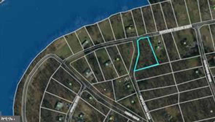Wooded corner lot with river access! This lot offers winter views of the river. The boat landing is only a block away. Seller has had soil work completed and has been granted a three bedroom  conventional septic that just needs filed with the county.  This is NOT a typical HOA. Shenandoah Shores POA is within the Warren County Sanitary District. The POA fee is collected by the County as a special assessment tax to fund road maintenance, snow removal, and maintenance of the common grounds. Perfect place to call home with nature abounding and yet close to town, I-66, and local attractions including hiking trails, wineries, etc.

**Survey completed. Lot lines are marked**