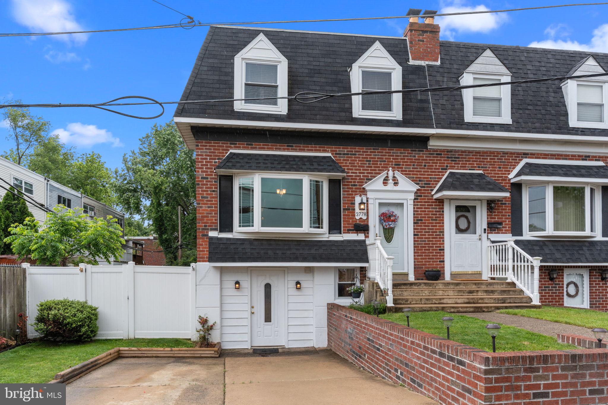 Welcome to 3778 Westhampton Dr – a beautifully updated 3-bedroom, 1.5-bath end-unit townhome in the highly desirable Parkwood neighborhood of Northeast Philadelphia.
This charming home blends character with modern upgrades and a spacious, light-filled layout. As you enter, you're greeted by a welcoming family room featuring a large bay window that fills the space with natural light. The flow continues into the dining room and kitchen, where a partially opened wall enhances the open-concept feel and creates a bright, connected atmosphere. A peek-a-boo opening from the kitchen into the living room further improves sightlines and brings even more natural light into the heart of the home.
Downstairs, the finished walkout basement adds valuable living space and features a cozy gas fireplace, half bath, laundry room, and access to a screened-in three-season room—perfect for relaxing or entertaining year-round. The basement also includes access to the garage, currently used as a storage area and workshop, offering tons of flexibility. Upstairs, you’ll find a spacious primary bedroom with large closets, two additional bedrooms, and a full hall bath.
Additional highlights include newer windows throughout, new rear siding, a new sliding door, double-wide driveway, and efficient natural gas HVAC with forced hot air.
Ideally located on a quiet street in Parkwood, this home is close to schools, shopping, parks, and commuter routes—offering the perfect blend of comfort, convenience, and value.
Don’t miss your opportunity to make this move-in-ready home your own!