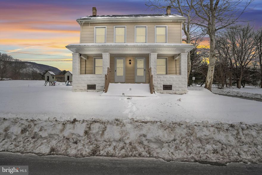 Classic farmhouse situated on 1.82 rural acres in Newville, PA. This home has been updated while maintaining its original charm. Features include a spacious double living room, and beautifully refinished hardwood floors throughout most of the first floor. The kitchen offers a center island, and there is a formal dining room ideal for gatherings.

The home includes 3 bedrooms and an updated full bathroom on each level. Recent improvements include new paint, flooring, and fixtures throughout, a new furnace with central air conditioning, a new water heater, numerous new windows, and two new septic tanks.

Outdoor living spaces include a large front porch and a screened-in side porch overlooking the property. A large, two-level barn provides excellent storage or agricultural use. Both the house and barn feature freshly painted metal roofs.

This property offers a rare combination of acreage, updates, and value. Property qualifies for zero-down financing.