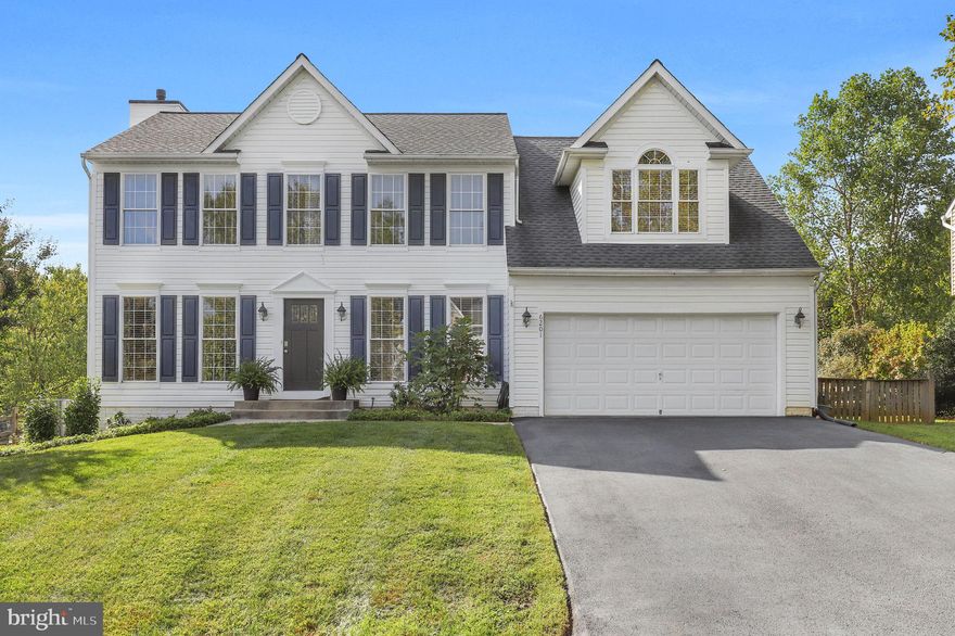 Welcome to this beautifully maintained 4-bedroom, 2.5-bath colonial in the heart of Columbia. This home features a classic design with wood floors, a stone-front fireplace, and custom cabinetry that enhances the inviting kitchen with stainless steel appliances. The main level includes a convenient laundry area and brand-new carpet. Upstairs, the spacious primary suite offers a sitting area, vaulted ceiling, walk-in closet, and a relaxing soaking tub. Enjoy outdoor living on the Trex deck overlooking a fenced yard with a storage shed. Additional highlights include a two-car garage, newer roof (2018) and HVAC (2023), freshly sealed driveway, and a basement with a rough-in for an additional bath. Perfectly located near Johns Hopkins Howard County Medical Center, Howard Community College, Merriweather Post Pavilion, and commuter routes 32 and 29—this home blends comfort, updates, and convenience in one ideal Columbia location.