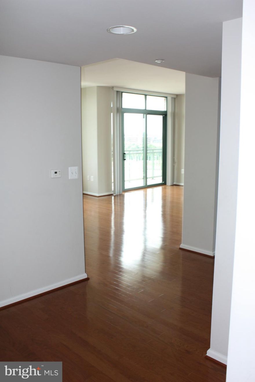 Beautiful, upgraded luxury 2 BR/2 BA condo on 12th floor in the heart of N. Bethesda with gorgeous views & just steps to the White Flint Metro & everything N. Bethesda has to offer. Open kitchen w/ stainless appliances, granite counters, wood floors throughout living areas, carpeting in the bedrooms & ceramic tile in the bathrooms. Master bedroom with oversized en-suite bathroom and walk-in closet. Freshly painted with new carpeting.  Full size Washer & Dryer in the condo and wrap-around balcony so that you can enjoy the gorgeous sunsets.  Coveys with two assigned parking spaces #149 & #150.  Condo building has fantastic amenities including: an outdoor pool, gym, patio/grill area, clubroom w/kitchen & big screen TV and 24 hour concierge. Across the street from fabulous Pike & Rose shopping complex, convenient to restaurants, movie theatre, banks, and shopping. One block tothe  White Flint metro station.