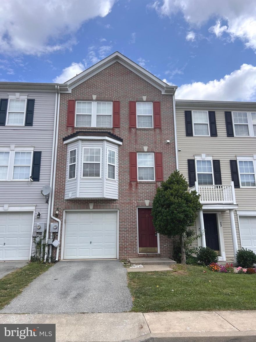 Nice Spacious brick front townhome with extra bump outs, close to shopping and commuting areas. All hardwood floors, stainless steel appliances, kitchen island, front loading washer and dryer.  Finished basement with wood vinyl flooring with walk out to a patio and fenced in backyard. Third level has bedrooms with wood floors, walk in closets and nice master bathroom. Ready to move in,  must pass criminal, eviction and credit check. Pets considered case by case with monthly Pet fee.