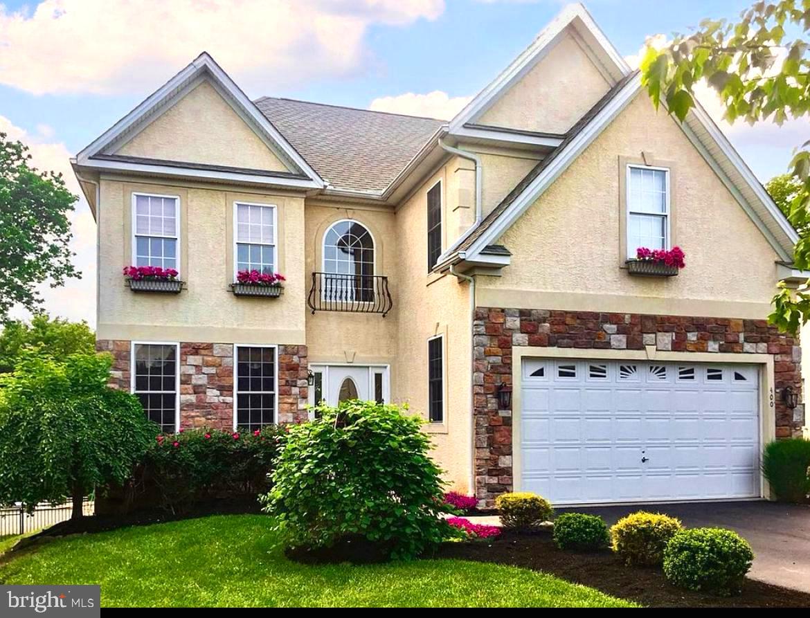 Welcome to 400 Baileys Run, a grand colonial home nestled at the end of a quiet cul-de-sac in desirable Springfield, Delaware County. Imagine the daily enjoyment of serene wooded views and calming sun-drenched spaces. As you enter the two-story foyer you will note every detail in this beloved home enjoyed by the original owners, and built by a family member. This main floor has everything! Impressive cathedral ceilings, a convenient office, a spacious formal living room, a gorgeous formal dining room, a sun room off of the kitchen with spectacular views of the back yard and Smedley Park, plus an exit to the large deck. At the center of the main floor is a beautifully equipped kitchen with a center island, breakfast bar and multiple ovens. The kitchen is the perfect compliment to all of the entertainment possibilities this main floor offers. As you retreat to the upper level of this home, you will appreciate the builder's attention to detail. The stunning front and back staircase has intricate wrought iron and gleaming wood. The bright, open hallway gives access to four large bedrooms including the impressive owner's suite. This space is exactly what is needed after a busy day. Have your morning coffee in the sitting area, another sun-drenched space with incredible views from floor to ceiling windows. And when summer becomes winter, turn on the fireplace and continue to relax here before enjoying your jetted tub in the en suite bath. Each of the other bedrooms are spacious and have great closet space plus hardwood floors and crown molding. Saving the best for last, is the fully finished lower level with a third fireplace plus outside access. This is truly a highlight of the property. Spanning the footprint of this home is a large gym space, entertainment/family area or whatever you envision. The views are equally impressive on this level. When you step outside to the patio, you have entered into a backyard oasis. Imagine hosting wonderful weekend celebrations cooking from your custom outdoor kitchen while swimming in your gorgeous in-ground, heated pool. This huge, private, fenced-in yard faces Smedley Park which provides unmatched privacy and peacefulness. You can enjoy walking/bike trails and unparalleled nature in this iconic local park. Additionally, this home has its practical side. Included is a whole-house generator. The HVAC system is mostly brand new (Zone 1, 2025 and Zone 2, 2022.) 400 Baileys Run is close to main routes to the Philadelphia Airport and Center City. Enjoy local shopping and restaurants as well. This is not just a home, it's a lifestyle! Schedule your tour today.