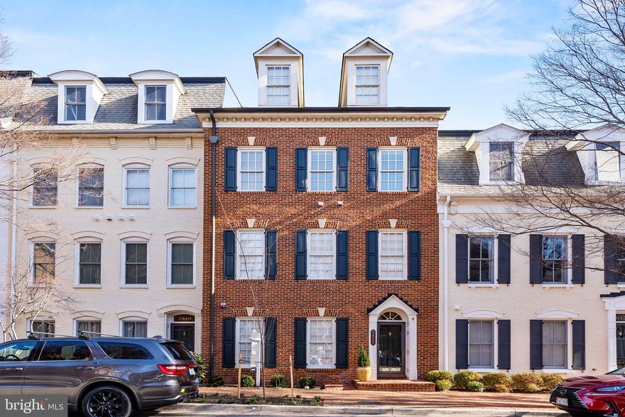 Welcome to this stunning, rarely available, light-filled, 5 BR 4.5 BA Federal style townhouse in the heart of sought after Potomac Greens.  Upon entry, you will be greeted by a gracious foyer and oak staircase.  This level offers a large guest room, a den/office, full bath, and a spacious 2-car garage.  Heading up to the main level you will find a true chef's kitchen with stainless appliances, double oven, granite counters, island, peninsula with seating, loads of cabinetry, charming breakfast area, pantry and a covered terrace.  Unwind after a long day in the family room with fireplace and custom built-ins.  Also on this level is a separate formal dining room, perfect for entertaining family and friends.  The third level features a primary suite with sitting area, 2 large walk-in closets, and a terrace.  The primary bath features double sinks, a soaking tub, and separate shower.  Two other bedrooms, a full bath, and a laundry room round out this level.  On the top floor, be delighted by the enormous flex space with extra high ceilings, perfect as a wonderful recreation room or a bedroom (or both!), plus a full bath.  The rooftop terrace is ideal for grilling, sunning, or enjoying time with family and friends.  Throughout you will find extensive millwork, recessed lights, loads of storage and high ceilings.  Freshly painted throughout and new carpet.

Potomac Greens is a vibrant community that provides many wonderful amenities, including an outdoor heated pool, clubhouse with a meeting/party room, fitness center, charming parks, tot lots, nature walking trails, and a pedestrian path to the newly-finished Potomac Yards metro. 

The location is truly unparalleled, with easy access to the GW Parkway and the metro stop a mere 5 minutes walk away.  Walking distance to shops and eateries; close to the Mt. Vernon Bike Trail and Potomac River.  Convenient to all that Old Town has to offer.  Two lights away from Reagan National Airport, close to Amazon HQ2, and the Virginia Tech Innovation Campus.

Make this truly exceptional home yours today!