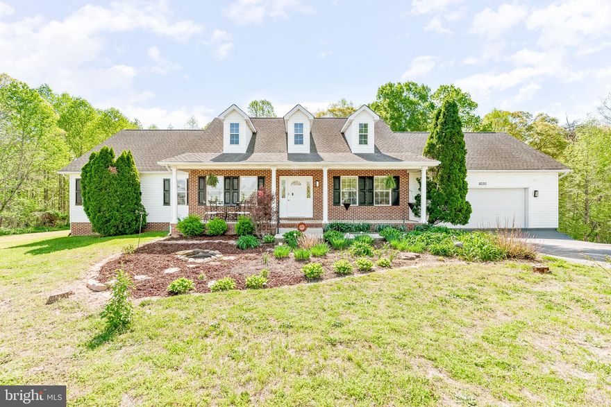 This Cape Cod has a strong presence from the street with a classic design and well-established landscaping that immediately stands out. The exterior is framed by mature trees and extensive flowerbeds that bring consistent color through multiple seasons, giving the property a finished, well cared for look.

Inside, the home offers more than 2,000 square feet, all on one level, with hardwood floors running through the main living areas. The kitchen has been updated with quartz countertops, a subway tile backsplash, and stainless steel appliances. The home has also been freshly painted and shows consistent upkeep throughout.

The backyard is set up to be used, with a fenced in garden area, shed, and a wooded backdrop that adds to the overall setting. A nearby strawberry patch is within walking distance, adding to the character of the location. Below there is a root cellar which is great for storage and could be finished for more living space. The attic is very large and also contains plenty of space for storage.