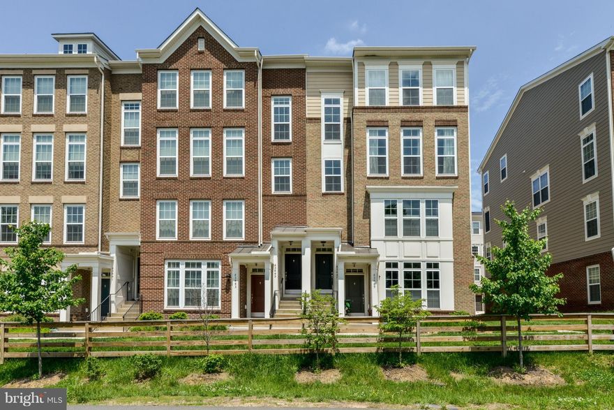 Gorgeous upper-level townhouse-style condo in convenient East Gate, easy Commute via Rtes 50, 28, and I-66! 3 BDRM, 2.5 baths - 2,400+ sf with a garage, loaded with upgrades, hardwood floors on the main level, upgraded carpet, gourmet kitchen with a huge island, designer lighting, Rent Includes Trash Removal, Water, and Sewer. Multiple pets OK