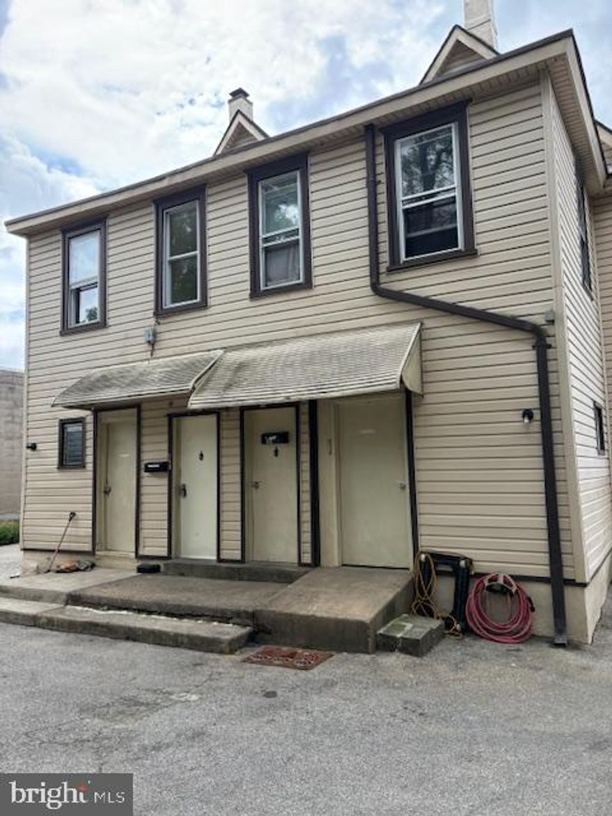 Great possibilities here, 5 units needs updateing, can be big rental building once rehabbed. The building currently houses a total of 8 bedrooms and 4 baths. Amazing parking lot.