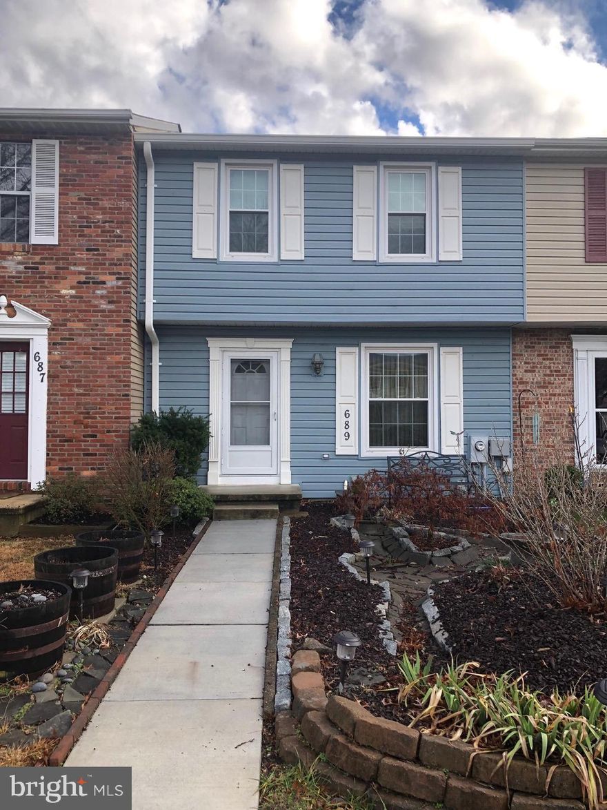 Welcome to your lovely townhome located in the Millrace community in Millersville with a beautifully landscaped front yard. The kitchen is recently updated with quartz countertops and 42'  wood cabinets. This home has been freshly painted and new carpet installed.  Most of the floors are tile or laminate. The main level dining area leads to a Trex deck and a fenced back yard through a new sliding glass door. Upper level has three bedrooms and a true master suite. Basement has a walkout to the back yard and a finished recreation room. Siding on this home is insulated, installed in 2009, which works with the triple insulated windows to make a snug home. The roof was replaced in 2014 with upgraded architectural shingles.