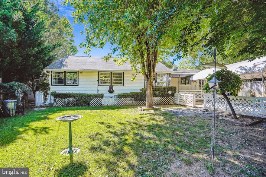 OPEN SATURDAY 10/12 FROM NOON - 2PM.....Value priced 2 level rambler on a prime cul-de-sac lot.....Yes it needs come work but you can certainly live here while you update....Enter through the covered front patio into the living room and dining area with hardwood floors....Kitchen has a newer stainless steel stove and refrigerator....UL full bath has a newer vanity and flooring....Each bedroom has a ceiling fan....Family room addition on the main level with an entrance to the side porch.....Lower level has 2 large rec rooms/game rooms.... The laundry area has a large sink perfect for that dog bath.....2nd full bath on the lower level.....The exterior is where this home really shines....Private lot with  3  separate porches/decks.  The front has a cover patio with a ceiling fan CAC which wraps around to the side deck off the family room.  And in the back is a brick patio which is off the dining room.....The yard is fully fenced  front and back and it's divided into 3 different fenced areas.  (The prior owner rescued dogs and needed to be prepared in case they needed to be separated)...Huge garden shed in the rear....Covered driveway.....Furnace age unknown but the outside CAC says 2014....Water heater 2022... Some paint, flooring refresh and you have a wonderful home.....Floor plan in the virtual tour.