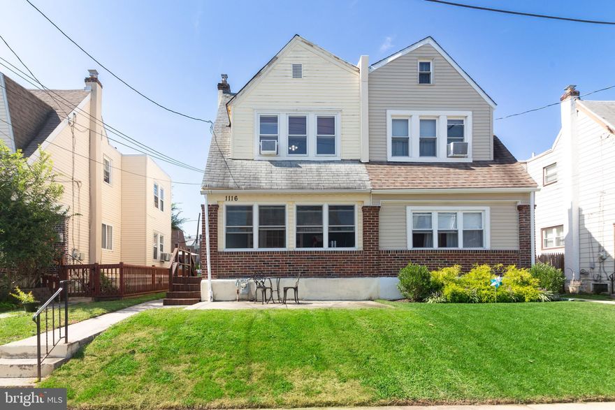 Welcome to Your Charming 3-Bedroom Twin Home. Nestled in a convenient neighborhood, this 3-bedroom, 1-bathroom twin home offers a delightful blend of classic charm and modern comfort. Enter this home through an enclosed front porch, complete with a built-in storage bench. This versatile space is perfect for a playroom or mudroom, ensuring a clutter-free home. Next you will step into the living and dining rooms where refinished original hardwood floors and newer ceiling fans create a bright and inviting atmosphere. It's the ideal setting for family gatherings and entertaining friends. The kitchen is cleverly separated into two areas—a work/prep area and a breakfast room. Updated appliances make meal preparation a breeze, and the breakfast room is perfect for casual dining. Upstairs, you'll find three bedrooms, including the primary bedroom with two closets, providing plenty of storage space. The full bathroom features a newer vanity and a linen closet. There is also an additional storage area over the steps. This property also includes a detached 1-car garage, a back and front patios for outdoor relaxation, and custom blinds in the living room and primary bedroom. This home is situated close to schools, shopping, and public transportation, this home offers convenience at your doorstep. Whether you're commuting or running errands, you'll appreciate the central location. Don't miss the chance to make this charming twin home your own. Schedule a showing today. Your new home awaits!