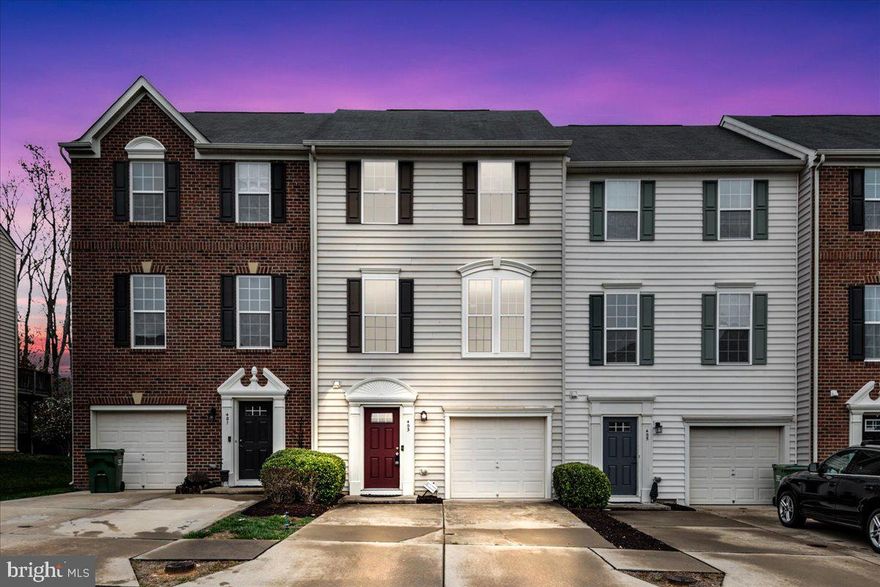 Charming 3-Level Townhome that has been Freshly Painted right off of I-95, and close to a commuter lot and minutes from the VRE!  Brand new flooring on the lower level. Spacious eat in kitchen overlooking a nice back deck with hot tub. Primary bedroom has a large walk-in closet and en-suite bathroom. Beautiful hardwood floors on the second level.  Walkout on the lower level to a fenced in back yard and 1 car garage with driveway.
