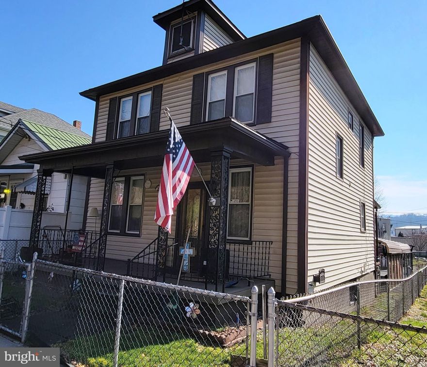 MOVE RIGHT IN! HOME FEATURES 3 BEDROOM AND 2 BATHS, LARGE LIVING ROOM AND  EAT IN KITCHEN.  UPSTAIRS HAS 3 BEDROOM AND A 4TH ROOM THAT COULD BE AN OFFICE, DRESSING ROOM, NURSERY OR 4TH SMALL BEDROOM, A WALK UP ATTIC, AND A FULL BASEMENT. THERE IS A HOUSE GENERATOR (GENERAC) AND REPLACEMENT WINDOWS.   OUTSIDE THERE ARE FRONT  AND BACK PORCHES, FENCED IN,  AND CARPORT IN REAR.