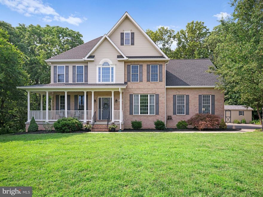 Welcome home to 8070 Alexander Place – a 4 bedroom, 3.5 bath colonial on over 1.5 acres that will leave you feeling the perfect blend of both tucked away, yet close to everything! Well located near commuter routes and all the area has to offer, this thoughtful home is completely move-in ready. The pride of ownership shines from the moment you pull up to this stately home. From the large front porch, a grand open staircase greets you as you walk through the door, flanked by formal living and dining spaces. A fresh and updated kitchen with eat-in area flows into the generous living area. Sliding doors open to composite deck and private, wooded backyard. Upstairs are 4 generous bedrooms. The luxurious primary suite with sitting area features a beautifully updated bath with standalone shower and modern tub overlooking the serene and private yard. 3 additional bedrooms and the main bathroom complete the upstairs. Downstairs, the finished basement spaces offer additional room for recreation and entertainment. Sliding doors from the basement rec room open to a lovely patio and gazebo with hot tub to convey. The large amish-built shed also conveys and has electrical hookup for an RV. This picture-perfect home was truly made to enjoy.