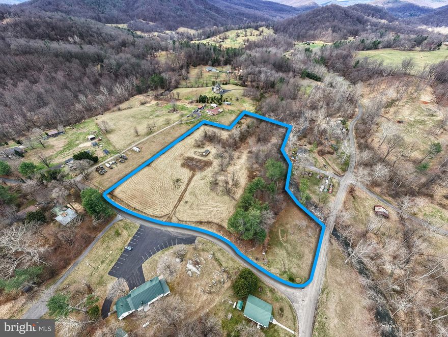 This mostly cleared 5-acre parcel of prime real estate in the highly desirable Sperryville area, presents a rare opportunity. No HOA and public road frontage. A licensed surveyor has recently marked the boundary corners based on a prior survey. The property is surrounded by attractive board fencing, enhancing both its charm and usability. The seller indicates that a well and power are present on site; buyers are advised to verify all utilities and improvements to their satisfaction before making an offer. Conveniently located just minutes from downtown Sperryville, offering restaurants, shops, antiquing, and more. Ten minutes from the Shenandoah National Park and the Inn at Little Washington, and less than 30 minutes to downtown Culpeper.  Do not miss this rarely found opportunity.