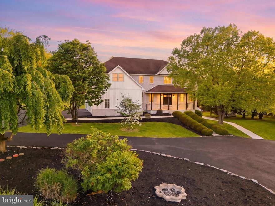 Welcome to 7 Beverly Court - a truly exceptional hidden gem in Carlisle where luxury, craftsmanship, and resort-style living come together on 1.66 breathtaking acres within Carlisle Area School District. Freshly completed and transformed from top to bottom, this absolutely remarkable residence offers more than 5,500 square feet of beautifully reimagined living space designed to impress at every turn. From the moment you arrive via the circular driveway and approach the inviting covered front porch with fresh, new modern cable railings and a striking new front entry door, the attention to detail and elevated design are undeniable. Inside, a grand foyer opens to sophisticated yet comfortable living spaces featuring refinished hardwood flooring, updated finishes, and thoughtfully curated details throughout. At the heart of the home is the stunning custom kitchen, designed for both everyday living and entertaining, showcasing custom cabinetry, expansive quartz surfaces, an oversized center island, herringbone ceramic tile backsplash, custom hood, oversized farmhouse sink, premium appliances, and seamless flow into the breakfast dining area and welcoming family room anchored by a gas fireplace adorned with wainscoting and new wood mantle. The main level offers incredible flexibility with multiple gathering spaces including an elegant formal living room, formal dining room with coffered ceiling and custom judges paneling, a dedicated office, playroom, or optional sixth bedroom, a beautifully updated powder room, and a functional laundry and mudroom area with direct access to the side-load two-car garage. Upstairs, the home continues to impress with five spacious bedrooms and four full bathrooms, including an extraordinary owner’s retreat designed to feel like a private luxury escape. The primary suite features an expansive sitting area, dual walk-in closets, and a spa-inspired bath complete with dual vanities, a custom tile shower, and a freestanding slipper tub. The finished walk-out lower level creates an entirely new layer of living and entertaining space with a large recreation room, second fireplace, custom wet bar with butcher block counters, fitness room with specialty flooring, and an additional half bath. Direct access leads outdoors where the experience becomes absolutely unforgettable. The backyard is your very own private retreat featuring an in-ground heated pool complete with diving board, slide, gas/propane heater, expansive patio and newly refinished deck featuring new cable railing, and a brand-new security fence securing the pool area, all surrounded by mature landscaping and the beauty of this incredible setting. Extensive improvements include a completed luxury renovation with fresh interior and exterior paint, custom kitchen installation, quartz countertops, upgraded appliances, fully renovated bathrooms, updated lighting & fixtures, refinished and new flooring, serviced HVAC systems, electrical updates, new siding, exterior enhancements, and professional landscaping. Opportunities like this are exceptionally rare - a fully renovated luxury property offering scale, character, modern updates, and resort-style outdoor living in one of Carlisle’s most desirable settings. Schedule your private showing today and experience everything 7 Beverly Court has to offer. Please ask for the complete list of updates and improvements.