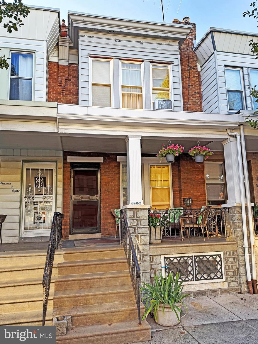Welcome to 1310 N 26th St .This charming 1920's house was updated with with  a timeless kitchen and restored original hardwood floors.  All bedrooms are well sized - not that  common  for 1920s row houses.
 Basement is the entire footprint of the house with mechanicals off to the side allowing for a nice opportunity to create a comfortable lower level living space if desired.  Has a very useable, large  porch from May to October.   FHA  and 23k loans acceptable. Make  this house yours !