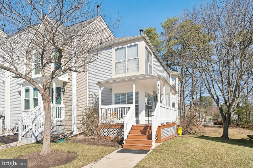 Welcome to this stunning END-UNIT 3 bed/2.5 bath townhome featuring a beautiful wraparound porch, perfect for relaxing outdoors and enjoying the charm of this quiet community. As soon as you step inside, you're greeted by an abundance of natural sunlight that flows throughout the home, complemented by recessed lighting throughout. The cozy family room features a fireplace and deck access which overlooks wooded views—ideal for morning coffee or evening unwinding. The kitchen boasts stainless steel appliances and granite countertops, plus a convenient half bath on the main level. Upstairs offers 2 bedrooms (walk-in closet offers ample storage room) and a full bath in the hallway, while the finished basement includes an en suite bedroom, full bath, and separate laundry room. Enjoy one assigned parking space and a community packed with amenities: basketball courts, outdoor pool, tennis courts, jogging paths, community center, and more!