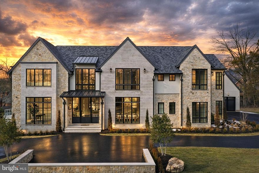 Designed to Lead: Where Architecture, Performance, and Excellence Converge. 

Rising quietly at the end of Ballantrae Court, this newly constructed ultra-luxury residence located in Ballantrae Farms, one of McLean’s most prominent neighborhoods, is a study in precision, power, and restraint—crafted for those who expect more and accept nothing less. Set on 1.54 private acres with a resort-caliber pool, expansive terraces, and a thoughtfully orchestrated site plan, the home delivers presence and sophistication without compromise. 

From the moment you arrive, the architecture signals intent. A metal-and-glass entry opens to soaring 11-foot ceilings, a floating white-oak staircase framed in steel and glass, and interiors defined by balance, flow, and light. Every material is purposeful: 7” wide white-oak floors, custom transitional millwork, solid 8’ doors, and floor-to-ceiling Marvin windows that pull the outdoors in while maintaining complete control of comfort and performance through a fully integrated smart-home ecosystem. 

At the heart of the home, the kitchen is engineered for mastery. Taj Mahal quartzite slabs, bespoke white-oak cabinetry, and a full suite of Gaggenau appliances—including multiple cooking surfaces, steam, convection, and induction—create a space that is as commanding as it is refined. A secondary catering kitchen ensures seamless execution for entertaining at scale, while the adjacent great room opens through automated glass walls to a covered outdoor living room with fireplace, heaters, and travertine flooring—an effortless extension of the interior experience. 

The upper level is devoted to retreat and restoration. The primary suite unfolds as a private residence within the home, complete with sitting room, fireplace, coffee bar, automated shades, and a spa-level bath with heated floors, soaking tub, and dual water closets. Secondary bedrooms are all ensuite, each finished to the same uncompromising standard, while a glass-enclosed laundry suite and upper-level family lounge elevate daily living. 

Below, the lower level is tuned for performance and play: an entertainment lounge with walk-out access, a wet bar with curated finishes, a gym with steam shower, a dedicated media and golf simulator-ready room, and a private guest suite. Every space is supported by serious infrastructure—Crestron Home Automation and Control System, luxury elevator access to all levels, 800-amp electrical service, 4-car main level garage with EV-charging capability, generator readiness —ensuring the home performs as beautifully as it presents. 

This is not simply a luxury residence.  It is a statement of intent.  A home designed to lead.  Minutes to DC, Tysons, and 495.  20 minutes to both Dulles and Reagan Airports.