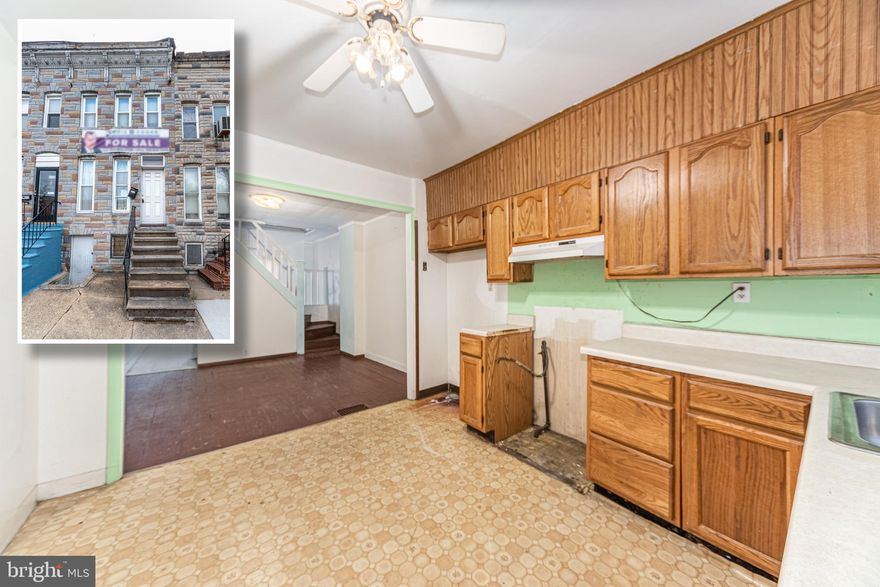 EXCELLENT OPPORTUNITY TO OWN THIS WASHINGTON VILLAGE ROWHOME WITH TONS OF POTENTIAL!    Main level features a spacious living room, separate dining room, and large kitchen, upper level with 2 bedrooms & 1 full bath, full basement that can finished to add more living space and with a separate outside entrance, it is a perfect opportunity rent it out to help pay your mortgage!  New roof installed a few years ago.  Located close to stadiums, downtown, UMMC, and major roadways.  Sold As-Is!