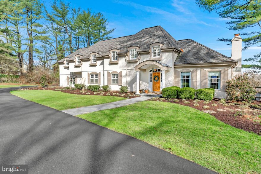 This stunning 4 bedroom, 3 full / 2 half bath home is situated on a gorgeous 4.1 acre lot in Pennsbury Township. Proximity to the route 52 corridor, Unionville-Chadds Ford schools. Picture yourself in this warm and inviting home featuring rich hardwood floors, elegant moldings and high ceilings throughout. An open, flowing floor plan and beautiful outdoor living spaces are an entertainer’s dream. The gourmet kitchen features an oversized island, abundant cabinetry, double ovens, gas cooktop, 48” Sub-Zero refrigerator, and new quartz countertops. From the kitchen, step into the family room with a gas fireplace and stone surround, and two sets of French doors that lead outside to the covered patio area.  The formal dining and living rooms boast large windows, custom built ins, a second gas fireplace and another set of French doors leading to the flagstone patio with wood burning fireplace. The first floor bedroom has an updated en suite bath with brand new tile, fixtures and fresh paint.  Upstairs, the sprawling owners' suite includes an expansive bedroom and sitting area with 9’ ceilings, an oversized walk in closet, a sunny bonus room / home office with deck access, and a recently renovated bathroom with high end finishes, heated tile floor, and an oversized shower.  Two additional bedrooms are  located on the 2nd floor - one with a built in window seat, drawers and bookcases, and one with a bonus room perfect for study or lounge space.  The additional 2nd floor full bathroom has double sinks and includes brand new tile, tub/shower, and fresh paint. The finished lower level with egress features a spacious recreation area, wet bar area, powder room and exercise area.  This home is truly unique and is the perfect blend of formal and informal living spaces. Schedule your tour of this beautiful and serene oasis today! Seller is licensed realtor in State of PA.