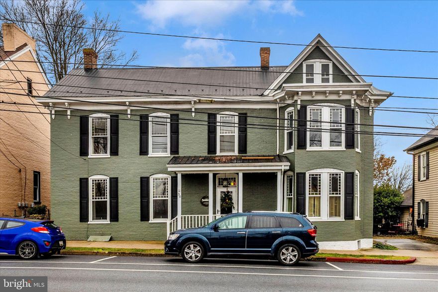 Come live among history in this remarkable pre-Civil War era home, originally built circa 1787, beautifully constructed with brick and log elements and located on West Potomac Street in the heart of Williamsport, Maryland. Just a short stroll away is the rich history and scenic beauty of Cushwa Basin and the C&O Canal, offering a timeless connection to one of Washington County’s most storied areas.

This historic home retains many original architectural features that speak to the craftsmanship of its era, including leaded glass windows, wide-plank wood flooring, original handrails, wall coverings, and numerous period details throughout. The main level features 10-foot ceilings, while the upper level offers 9-foot ceilings, creating a spacious and elegant feel rarely found in homes of this age.

Adding to its character are three fireplaces, two enclosed porches, and a charming backyard with off-street parking and rear alley access, blending historic charm with everyday convenience.

While the home has undergone several renovations over the years, additional restoration opportunities remain, allowing the next owner to thoughtfully enhance and preserve its historic integrity. With the right vision, this property offers the potential to become a truly exceptional historic residence or possibly a future bed-and-breakfast, subject to city approval.

Offering four bedrooms and two full baths, this is a rare opportunity for a historic-home enthusiast or investor to own a meaningful piece of Williamsport’s past while enjoying the lifestyle, walkability, and nearby attractions that make this area so desirable.