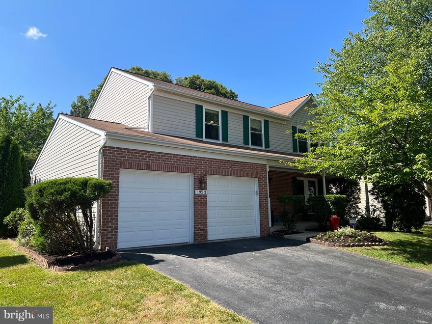 This lovely 2-car garage colonial is located in Odenton's Seven Oaks Community, and has a 2.75% VA Assumable Mortgage!  Spanning 3 levels totalling over 2,600 square feet, this home offers 4 spacious bedrooms, 2.5 bathrooms, 3 living spaces, a formal dining room, large kitchen, and plenty of storage space.  As you pull into your 2-car driveway, you will notice lush landscaping leading up to an expansive front porch, perfect for that morning cup of coffee!  Head on in to find a formal living room and dining room to your right.  Off of the dining room is a large, open concept kitchen-family room combo that also leads out to your fully fenced yard where you can start making beautiful memories this summer.  The neutral palette in the kitchen includes grey cabinets, upgraded granite countertop with large, double, under-mount sink, upgraded fridge and dishwasher, gas range, an elegant backsplash, pendant lighting over your butcher block top island, and a pantry cabinet. You will also find a powder room on this level, as well as real hardwood floors throughout.  Upstairs are your 4 bedrooms, and 2 full bathrooms.  Primary bedroom boasts a vaulted ceiling, walk-in closet, and ensuite bathroom with double vanity and lots of counter space and storage.  You will find your third living space in the basement in the form of a large rec/flex room.  The basement also has a huge storage area adjacent to your utility room.  The community offers many amenities, and there is shopping, dining, and entertainment nearby.  This home is just minutes to Meade, and a short drive to Downtown Annapolis, Waugh Chapel Shopping Center in Gambrills, and Arundel Mills Mall.  Also easy access to major commuter routes that will take you to Fells Point in Baltimore or if you want to go explore the museums or zoo in DC.