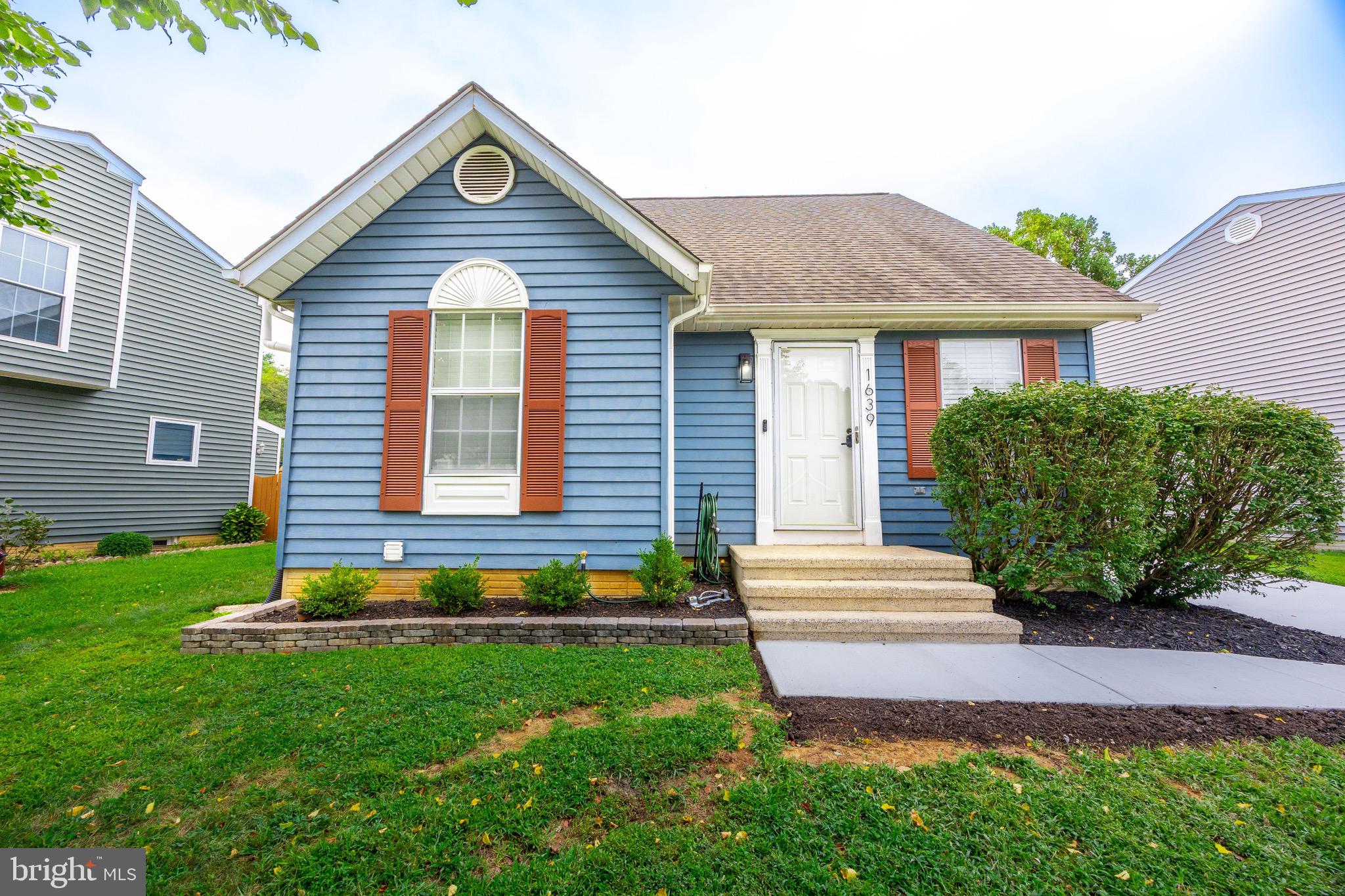 Welcome to this beautifully maintained home featuring a perfect blend of modern updates and classic charm. From the moment you arrive, you’ll love the inviting curb appeal with fresh landscaping, a welcoming front porch, and attractive blue siding accented by shutters and a BRAND NEW concrete sidewalk and driveway. Step inside to find a bright and airy open floor plan with gleaming hardwood floors, neutral paint, and plenty of natural light. The spacious living and dining area flows seamlessly to the updated kitchen, which boasts white cabinetry, granite countertops, stainless steel appliances, and ample storage. Upstairs, the generously sized bedrooms feature vaulted ceilings and large windows, creating a comfortable retreat for the whole family. One of the highlights of this home is the large back deck—ideal for entertaining or relaxing outdoors. Complete with a covered gazebo, seating area, and plenty of space for gatherings, this backyard is perfect for summer evenings.