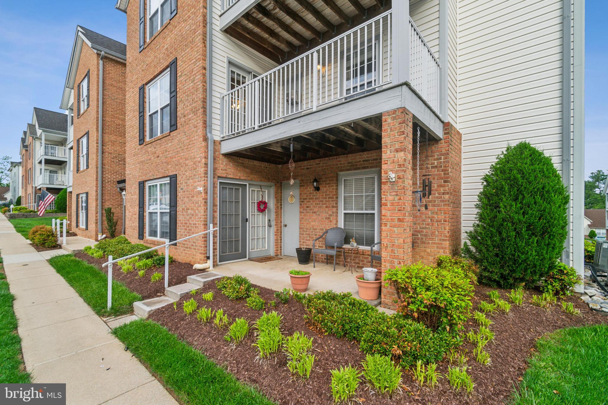 Welcome to Winifred Manor, a desirable 55+ independent living community in the heart of Eldersburg! This well-maintained FRONT FACING 2nd floor condo—accessible by both elevator and stairs—features a spacious open floor plan with 2 bedrooms and 2 full baths. The large primary suite includes a generously sized walk-in closet, offering ample storage. Enjoy an eat-in kitchen, elegant crown molding, and recent updates including a heat pump and garbage disposal. The community center is perfect for social gatherings, games, and activities, and a charming gazebo near the entrance adds to the welcoming atmosphere. The condo fee covers water, sewer, trash, snow removal, lawn and landscaping care, and maintenance of common areas—making for truly low-maintenance living. Just minutes from shopping, dining, and local amenities, this is a wonderful opportunity to enjoy comfort and convenience in a vibrant 55+ community!