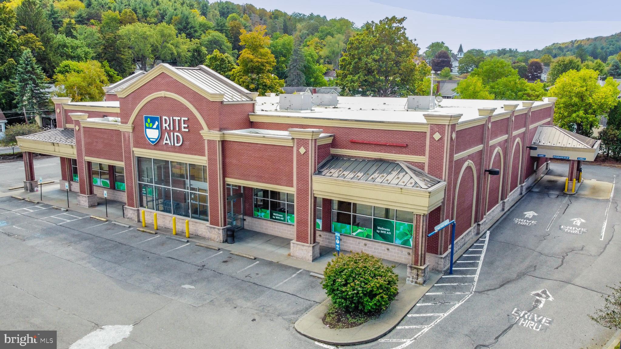 Available for LEASE or SALE. Formally occupied by the national tenant Rite Aid, this 13,813 SF retail building is situated on a 1.37-acre corner lot in the historic town of Wellsboro, PA. Built in 2003, the property features excellent visibility, a drive-through, brick exterior, ample parking, and an overhead delivery door. This site is ideally suited for a variety of retail uses, including a grocery store, bank, credit union, or hardware store. Call today for additional information.