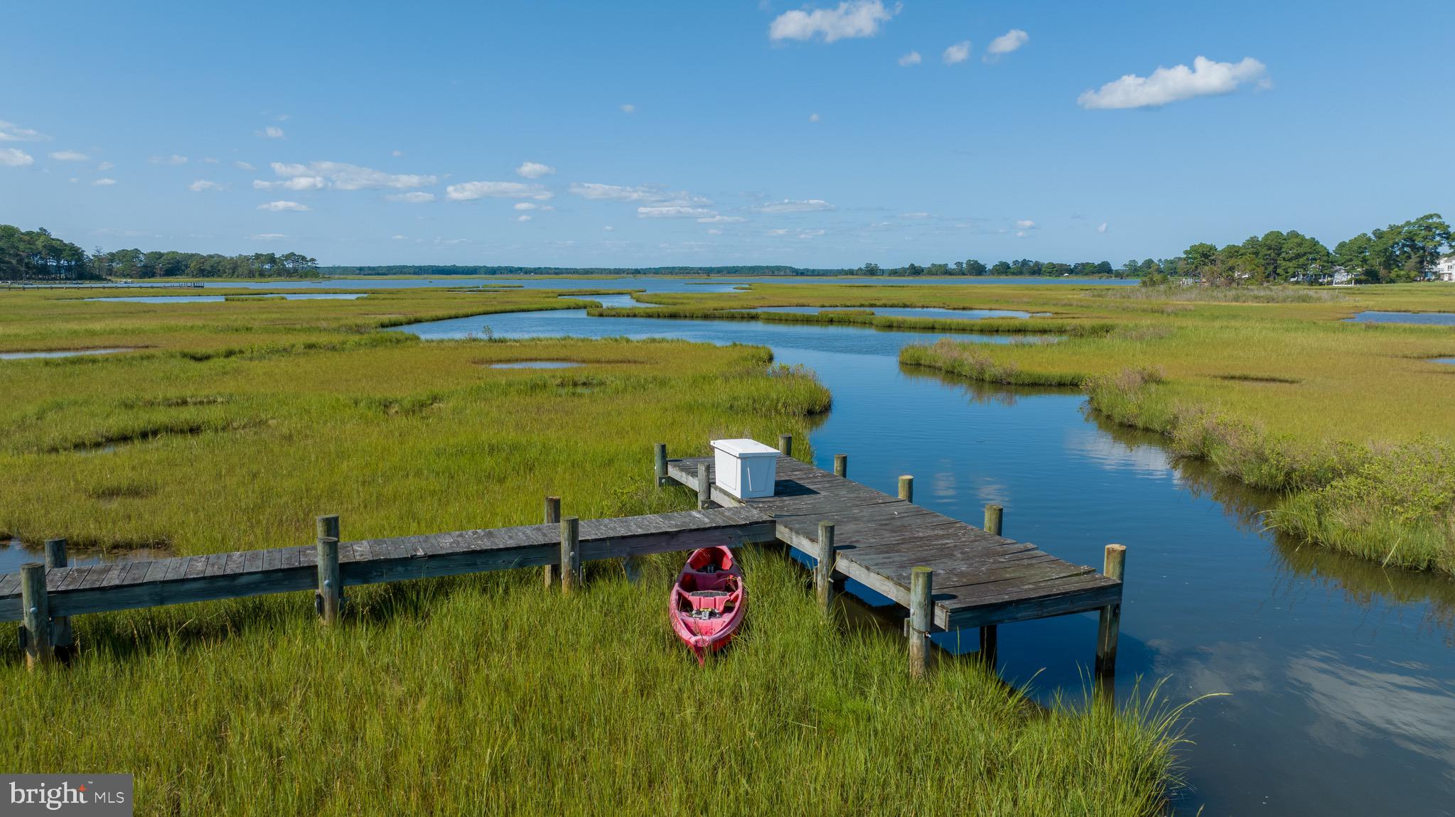 Motivated Sellers Welcome to Lot 26 in South Point's Indian Creek community—a one-of-a-kind, 13.14-acre waterfront spot that’s perfect for building the coastal home you’ve always dreamed of. With over 6.5 acres of buildable land, you've got room to let your imagination run wild.
Love the water? You're in luck. A 300-foot dock (shared with the neighboring Lot 27, which is also up for grabs) is ideal for kayaking, paddle-boarding or simply relaxing, offers direct water access to Newport Bay and Sinepuxent Bay. A county boat-ramp is just a mile down the road.
Indian Creek isn't just any community; it's a peaceful hideaway with only 32 lots, where you can enjoy the best of both worlds. Feel like you're miles away from it all, yet you're just a quick drive from Assateague Island and Ocean City Golf & Yacht Club. And for those days when you're craving some action, Ocean City's attractions are only 8 miles away.
Good news: a perk test has already been done and the county has it on file. That means you're one step closer to breaking ground on your dream home.
Come see for yourself what makes Lot 26 so special. Whether you're an outdoor enthusiast, a nature lover, or someone who just appreciates a beautiful view, this is the perfect place to create a home that’s uniquely yours.
Minimum Home Sqft size is 2500 first floor and 3000 Minimum total home size