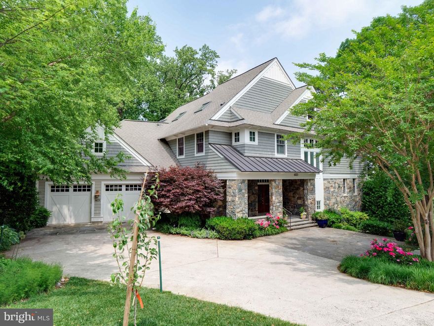 Awesome and then some!  4651 35th Street North, custom built by home builder  Morris-Day Architects, Inc. is just that! Masterful and skillful workmanship and design is found throughout the approximately   7000 square foot home and continues to the borders of a most incredible park-like setting (almost a half acre). True to the Morris-Day style this  comfortable yet eloquent  home  has extensive wood beams, custom paneling and cabinetry, ultra-high ceilings and expansive windows. The main level design is an open concept featuring a breath-taking family room with a floor to ceiling fireplace with stone surround, a dining area for more formal gatherings along with a casual dining area off the chef's kitchen which is fully equipped with a large center island with pendant lighting,  two undermount sinks, Sub Zero refrigerator, Wolf  stove , 2 Wolf  ovens and microwave, 2 Asko dishwashers and two walk -in pantries.  A mudroom with expansive storage as well as a private deck complete with a gas grill for outdoor dining is located in the rear of the main level.   A lovely library or home office is in the front of the home overlooking the neighborhood.  A main level bedroom suite  (could be a primary bedroom...it is that nice) has a  Marble spa bath with built-in vanity and closets aplenty plus a private deck accessed by double glass doors.  Don't miss one of the many porches off the family room. This one has retractable screens and a stunning view.    The upper bedroom level has 3 spacious en suite bedrooms, one with a reading nook, and all with the architectural detailing that makes  this home so very special.  The primary bedroom suite has a tray ceiling with cove lighting, its own private deck, a coffee bar with refrigerator and of course,  large closets.  The spa bathroom has Carrera marble flooring, full standing shower and a built- in vanity.  Unifying the bedrooms in the center of the 2nd level is a  family room or study area or another office.  Head up to the 4th level where the current owners designed a bedroom/playroom getaway that suits this space so very well. The lower level has it all and could have even more!  The  recreation room complete with full wet bar, wine captain and mini frig opens to a covered garden patio complete with gas  log fireplace.  There is also a fitness/yoga room or if need be, an additional  home office.  A guest/au pair suite is also found on this level. AND THEN...there is a large open basement originally outfitted for a sophisticated workshop, and now ready for whatever you need....workshop again, home theater or just a playroom.  The lower level provides easy access to the secluded splendor of the rear grounds surrounded by nature which you must absolutely see for yourself. Perennial gardens and walkways lead to a veritable park with a tree house and large play area.  There is a professionally installed koi pond with cascading waterfalls and amazing hardscape.  For pet lovers there is an invisible fence....what a treat for your pet to wander on these grounds.  The rear of the property is fenced as well. Unmatched in all seasons! The numerous patios, decks on all levels provide a choice of gathering spots all with incredible views.  Lutron lighting plus sophisticated audio, exterior cameras are  found throughout the home. There are 3 zones of natural gas heat, a whole house natural gas generator and the ability to install an elevator. 4651 35th St North is unmatched in so many ways.  It is a must see home!