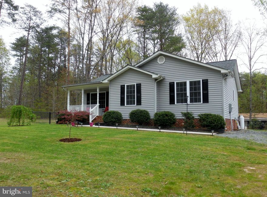 This 3BR/2BA Rambler sitting on 1 acre near Lake Anna is waiting for you! Recent Updates include:Granite Counters &SS Appliances,Hardwood Floors in LR & Hall,Ceramic Tile in Baths. Open LR w/Vaulted Ceilings & Gas FP.  Relax & Enjoy the deck that overlooks a fenced rear & side yard. Large Driveway offers lots of room to park Cars, Boats, RV. No Home Owners Association! Call today to view!