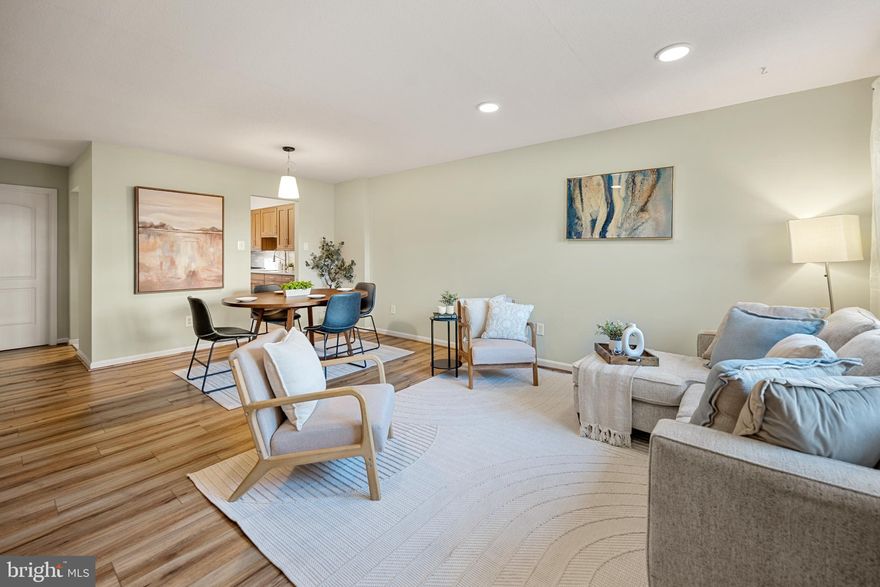 Welcome home to Bedford Park! This beautifully updated 1-level townhome-style condo combines thoughtful renovations with a prime Arlington location. Luxury vinyl plank flooring flows throughout the open-concept living and dining areas, creating an inviting space perfect for both everyday living and entertaining. The kitchen has been updated with new Shaker-style cabinets, sleek quartz countertops, tile backsplash, under cabinet lighting, and modern stainless steel appliances (2022). This home offers generously sized bedrooms with ample natural light and updated closets with improved storage and organization, each with its own private en suite bathroom. Additional major updates include a newer water heater (2024) and energy-efficient windows (2016). Convenience continues with in-unit laundry (2020) and a front patio perfect for morning coffee or relaxing evenings. Just minutes to Clarendon, Ballston, Pentagon City, Harris Teeter, Trader Joe's, Virginia Hospital Center, Lyon Park Community Center, Fillmore Park Trail, and the Pentagon. Quick access to Clarendon Metro Station, I-395, Route 50, and I-66. This move-in ready home combines modern updates with an ideal Arlington address - schedule a private showing of your gorgeous new home today!