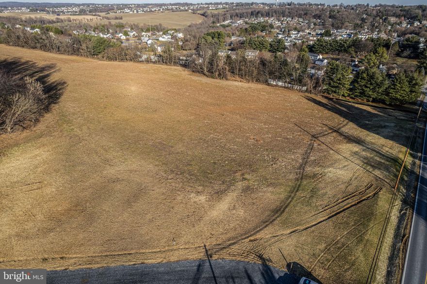 Welcome to a rare and extraordinary opportunity to own over a 3.7 acre lot in a picturesque Parr's Landing in Mount Airy Maryland. Breathtaking pastoral views, this lot presents an unparalleled opportunity for building the estate of your dreams. With its generous size and serene surroundings, this parcel offers the perfect canvas for creating a custom residence that harmonizes with the natural beauty of the landscape. Conventional perc up to 6 bedrooms offers the most possibilities for the neighborhood!  Just outside of the Mount Airy city limits, you'll embrace the tranquility and privacy of this exclusive setting, while bringing your vision to life on this remarkable piece of land.

*Covenants and  Driveway Maintenance Agreements are being recorded*