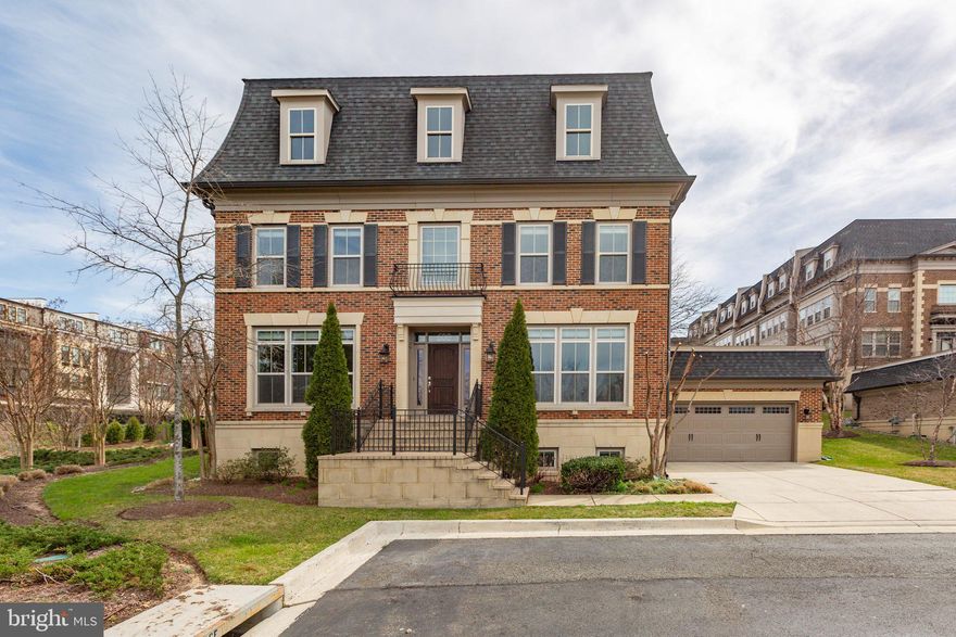 Bring us an offer and  Come be king/queen of the Hill and master of the Harbor in this large, like-new construction, detached home that affords wonderful, million-dollar views of both the Potomac River waterfront and the DC + VA Skyline.  Sitting along the first row of residential homes in the National Harbor community and just blocks from the waterfront retail and restaurants (less than 1/2 mile to Potomac River), this unique  property is one of only four detached homes in the entire neighborhood. Its corner placement as "house unit #1" and orientation in this prime, ‘pole-position’ location afford it the best city and water views of all four detached homes as well as amongst the neighboring townhomes. This all-brick & stone 4BR/3 full Bath/2 half Bath home on 3 fully finished levels+ Garage & Terrace was built by Integrity Homes in 2011...and has only been updated and enhanced since with finishes and fixtures that won’t disappoint.  The extensive renovation in 2022 included new wood floors & carpeting, updated Bathrooms, full house paint, fully finished Basement, improved Wet Bar off Terrace, and new Kitchen (with upgraded cabinets, countertops & GE Café Appliances). Big spaces, good natural light, wonderful views, attention to detail and versatile spaces/layout  highlight every room in this house and give it  a wonderful sense of feel and flow.  The main level greets you with a 2-level center, circular Entry Foyer and boasts floor-to-ceiling windows in all the rooms.  The formal Dining Room (or Den or whatever you want) is off to the left and Living Room off to the right  in the front of the house.  The Office/Library with double French Doors and Powder Room are  just off the 2-story center foyer and lead nicely to the rear of the house where you will find the Family Room/2nd Living Room w/ fireplace and oversized eat-in Kitchen with Island. Just off the Kitchen are stairs to the Mud Room, attached 2-Car Garage and leading down to the finished Basement. From the Center Foyer, head upstairs to the Wet Bar landing that leads to the large outdoor, private Terrace with plenty of space for sitting area, grill and dining al fresco (did I mention those views?) Continue past the Terrace Level to the top floor with the circular 'hallway' that leads to all 3 Bedrooms and Laundry Area. The Primary Bedroom incorporates the back half of the second floor and boasts a sleeping area + sitting area with fireplace, 2 walk-in closets and a luxurious, gigantic en-Suite Bathroom with walk-in shower, soaking tub, water closet/enclosed toilet,  and double vanity. From the sitting and sleeping area, you have monumental views (literally) of the DC + Alexandria skyline. In the front of the house are 2 additional, spacious Bedrooms that provide  wonderful, direct water views and share a 'Jack & Jill Bathroom.'  Heading back down to the lower level brings you to a completely finished & versatile basement space that includes a  4th Bedroom with full Bathroom en-Suite, Den/Rec Room, a 2nd Powder Room (Half Bathroom), 2 additional finished rooms (could be Gym, Art Room, Storage...) plus Storage Areas and Mechanical.  The house is walking distance to all that National Harbor has to offer and provides EZ access to 495/295, Old Town Alexandria  and downtown DC/Capitol Hill. A VA appraisal was recently conducted on the property and came back at full value with no conditions. The house is technically classified as a condo within the HOA but is built as a detached, single family home.