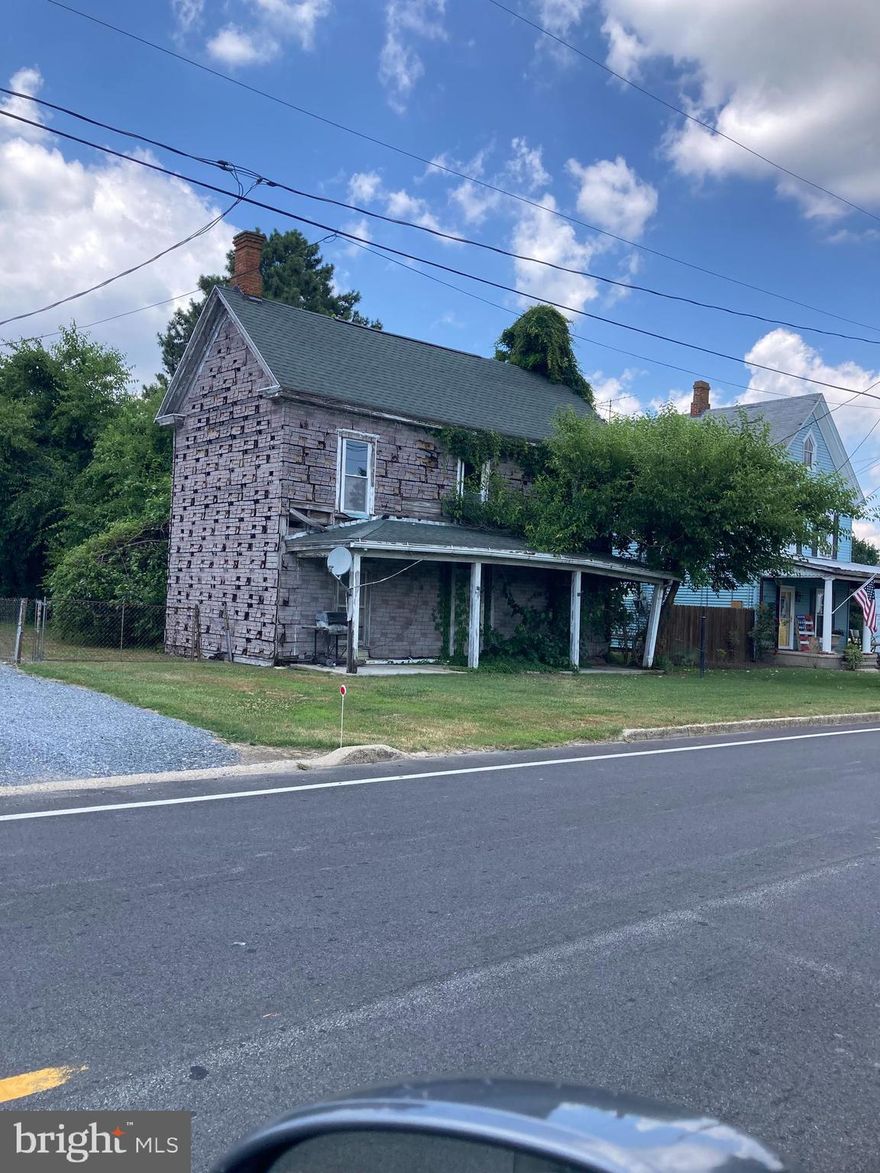 The house on the property may not be entered for any reason.  It has not been inhabited since early 2000's. The house will most likely need to be torn down. Enviornmental Health in Caroline County has very little information other than that a 3bedroom septic was put in somewhere on the property in 1975.  Location of well is unknown by owners and by Health department.  BUYER BEWARE.