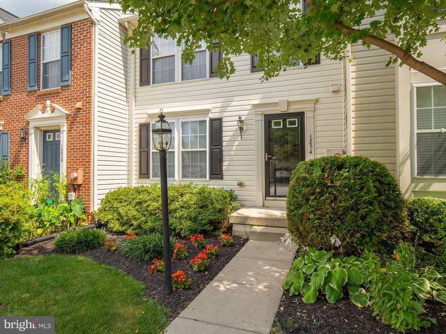 Welcome home to this well-maintained townhouse with great curb appeal!  Front entry and outdoor patio boast inviting landscaping for enjoying the outdoors. Open floor plan and spacious eat-in kitchen connects to dining and additional living space. Expansive master bedroom features two walk-in closets and en suite bath with soaking tub and separate walk-in shower. Lower-level has full bath, laundry area, and large rec room that leads to ground-level patio for outside entertaining. HOA includes lawn care & snow shoveling. Great location close to Rt 9 for easy commute.