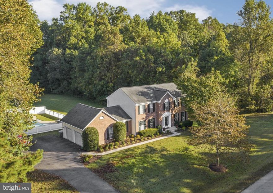 ***Coming Soon***Your own backyard oasis awaits...underground POOL, HOT TUB, large maintenance free deck for entertaining...all on a lot that is just under an acre. This beautiful brick front colonial boasts almost 3,000 sqft on the main & second floors and an additional 1253 sq ft in the lower level.  It includes 4 spacious bedrooms, 3.5 baths, an office on the main level, hardwood floors, and a large 2 car side-load garage.  The custom gunite pool is spectacular.  The pool is 23x40, includes two love seat benches at the deep end and a built in extra large staircase, concrete surround and a vinyl fence.  The main level includes: Foyer, large formal LVRM, Dining Room, Office, Laundry Room, Kitchen with white painted cabinets, granite countertops, recessed & pendant lighting that opens up into a spacious Family Room with a gas fireplace. The second floor includes 4 Bedrooms.  The Primary Bedroom is spacious and includes a cathedral ceiling and a large walk-in closet.  The Primary Bath includes a whirlpool tub, separate shower, double vanities, and tile floors. The lower level includes a rec room, office/hobby room with two double french glass doors and a full bathroom. Photos to come!