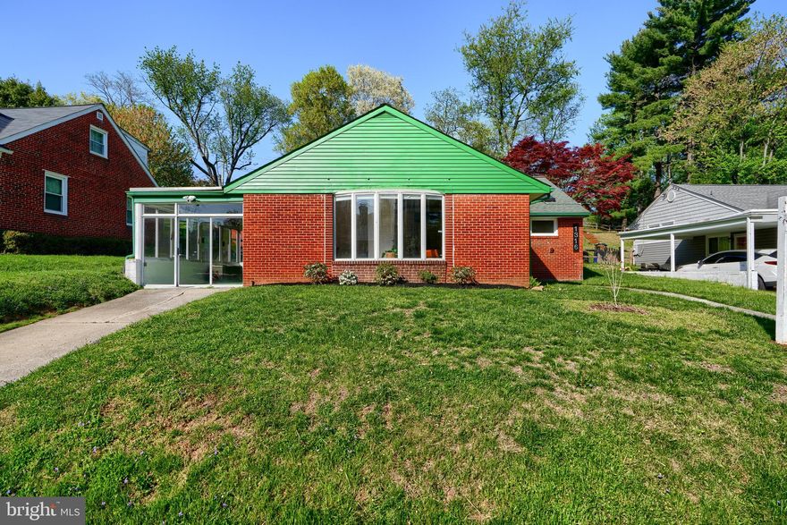 Step into this light-filled mid-century modern gem, where timeless design meets practical living. This 3-bedroom, 1-bath home is full of character, featuring warm light wood floors, tall ceilings with exposed wood beams, and a classic double-sided wood-burning fireplace that anchors the heart of the home.

The main level includes a separate dining room—perfect for gatherings—and a bright, functional kitchen with clean white cabinetry and a simple, inviting aesthetic. One of the three bedrooms is located on the first floor and features stylish shiplap siding, making it an ideal space for a home office, guest room, or cozy retreat.

Upstairs, you’ll find two generously sized bedrooms that offer serene views overlooking the lush backyard, filled with mature and native plantings and often visited by local wildlife.

The finished lower level provides a comfortable family room, while the unfinished side offers plenty of storage. Fully owned solar panels mean long-term energy savings with no lease to assume—an added bonus for eco-conscious buyers.

Enjoy the outdoors from the three-season side porch, and take advantage of the 2-car driveway for easy off-street parking.

Don’t miss this rare opportunity to own a thoughtfully designed mid-century home that blends timeless style, modern comfort, and a beautiful connection to nature.