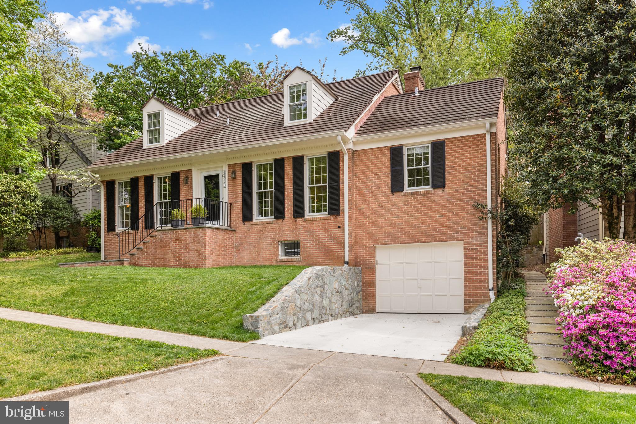 New to the Market! Over 4,000 square feet of finished living space in the coveted Overlook section of Westmoreland Hills sits this charming 4 bedroom, 4.5 bathroom Colonial with garage parking that has beautiful wooded views across into the Little Falls Stream Valley Park.
Off the gracious entrance foyer you will find a sun-drenched and renovated Gourmet eat-in kitchen that has updated counter tops, stainless steel appliances, an abundance of storage, ample counter space and a breakfast area. Through a swing door from the kitchen is the formal dining room that has a picturesque bay window. Adjacent is the oversized living room that has a wood-burning fireplace and French doors that lead out to a private backyard oasis. A renovated powder room and coat closet complete the entertaining spaces. Also on the main level you will find a wonderful home office as well one of two primary bedroom suites that has a full bathroom.
Upstairs is the second primary bedroom suite with a walk-in closet and en-suite windowed bathroom. There are two additional bedrooms with a jack-and-jill window bathroom. Also on this level is a hallway linen closet.
Down to the lower level is a spacious recreation room, a library / media room, a home office, a full bathroom, a laundry room, a storage area and a mechanical room. You will also find access to the oversized garage that has room for one car plus storage.
The fully fenced in backyard has a patio and lawn area as well as a gate into a common space of the Overlook community. As part of the HOA, residents enjoy exclusive access to amenities including a swimming pool, playground, walking paths, and year-round neighborhood events. HOA Fee is $2,100/year.