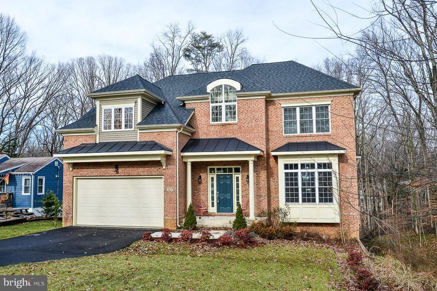 Light filled spaces and gleaming hardwoods, gourmet kitchen with center island, deck off the breakfast room.  This great home offers all the conveniences of a new home (2 yrs old) but it has the feel of being in the country with a private tree filled back yard. Combined with the ease of city living (only two miles from Franconia Metro and the mall) this type of opportunity rarely occurs.