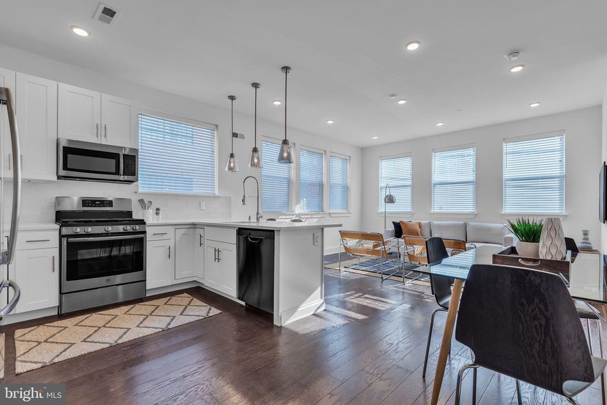 Introducing a perfectly located Bi-level condo with a private, assigned parking spot! This Fishtown gem is just 5 years old, and has about 5 years left on the tax abatement. When entering through your own private entrance, you’re greeted with a flood of natural light through two walls of windows. Your kitchen has stainless steal appliances, classic, white shaker cabinets, and quartz countertops. The eat-in peninsula is perfect for hosting guests, while the large living space is bright and functional. A stylish half bath rounds out the first floor.  Head downstairs to your laundry area and full bathroom. This full bath features upgraded finishes including a deep, modern tub, glass shower surround, and a large vanity with tons of storage. The spacious bedroom feels like a tucked away oasis, a perfect escape from your busy city life.  This property sits on a quiet block, but is located within a 5-10 minute walk from Fishtown and Northern Liberties’ hottest spots. Just steps from Penn Treaty Park, The Fillmore, and many of the best bars and restaurants in the city. You can not beat this location with parking!