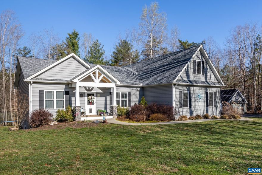 The peace & quiet of country living nestled on 6.6 acres with tons of privacy!  This 4,000 sq. ft., 5 bedroom/4 bath home was designed for larger family livability that offers comfort and style.  Enter into main level that has an open concept floor plan to include a chef's kitchen with gas range, double wall oven, quartz counters, pantry, & island.  A dining area, family room with fireplace, first floor master suite w/walk-in closets, master bath w/double vanity, two additional bedrooms and full bath, mud room w/washer/dryer hookup. Walk out onto the closed-in porch or on the deck where you can entertain family & friends all year long either relaxing in the hot tub or taking a swim in the pool while the kids can enjoy hanging out in the tree house or everyone can meet at the fire pit to roast S'mores. The upper level has a separate study & office space, which could be used as addtl. bedrooms and a full bath. Lower level offers separate living with kitchen, dining area, family room, 2 bedrooms, rec/exercise room, laundry & full bath with walkout access to the hot tub or pool.  Hardwood floors throughout. Home has internal/external home sound system.  Chicken coup & shed convey.  Energy efficient solar installed.  No HOA!,Quartz Counter,White Cabinets,Fireplace in Family Room