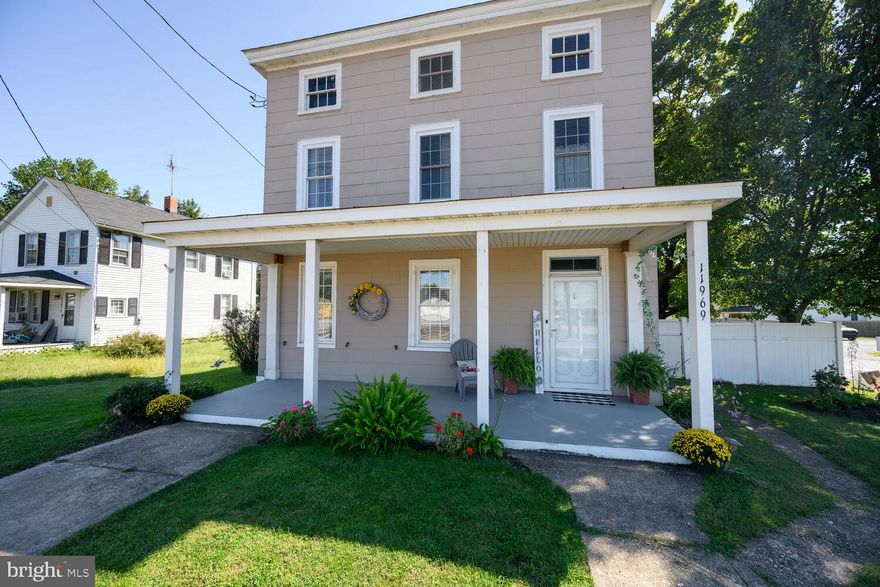 Vintage home with lots of original details retained.  3 Staircases, 3 original fireplaces and a very grand front foyer and staircase give this home so much character! Current owners have updated it lovingly throughout.  Enter through the spacious back yard, into a welcoming mudroom with a full bath on the main floor to your left and then into the updated and cozy kitchen with new dishwasher, LVP flooring, complete with the cutest back stair case! The staircase leads up to a separate home office, craft room, den,  or 4th bedroom. 
Also downstairs is a main floor bedroom,  a nice size dining room with decorative fireplace and parquet flooring, and a  Living room  with new carpet, and a new pellet stove to keep you warm on those chilly nights. 
On the 2nd level are 2 bedrooms plus the office, and a full bathroom. Full stairs to the 3rd floor leads to 2 additional rooms that could easily be finished into more living space. 

Since 2018 the current owners have updated  the home to include:
Encapsulated crawl space, new Oil Furnace,  2 new water heaters (one serves upstairs bathroom only). New dishwasher, blown in insulation in all internal ceilings and attic, new flooring downstairs,  kitchen and bathroom updates,  and so much more! 

Outside is a very private oasis. Completely in yard with large covered side porch and open back deck looking out to manicured lawn with large shed and  nice plantings.  Back gate leads to gravel driveway, parking for 2-4 cars

The home is very versitile. Village zoning allows for  commercial use as well. In the past it has been an antique/retail store, but please verify any possible uses with the county first.