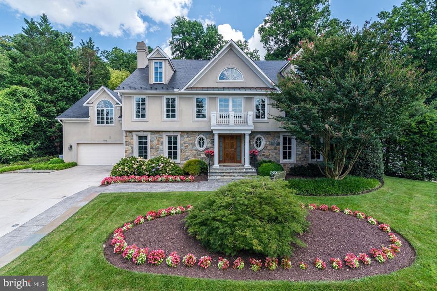 Located in the Burning Tree area on one of the most sought-after streets in Bethesda, 7520 Arrowood Road checks all the right boxes. Graced with generous entertaining spaces, sun-drenched rooms, and an incredible backyard, this home suits today’s modern lifestyle with a number of luxurious amenities built into the footprint of the residence. Offering 6 Bedrooms, 6 Full Baths, and 2 Half Baths, this property spans 4 finished levels and approximately 8,100 total square feet. Major renovations have created a wonderful two story family room with fireplace and wall of windows and atrium doors overlooking the patio and private backyard backing to Burning Tree CC. The kitchen upgraded and renovated in 2016 features high end appliances and cabinetry that will please even the most discerning cook. The attached 2-Car Garage has an expansive Heated Driveway for comfort and convenience. Set on a 0.46-acre lot backing to the Burning Tree Club, this idyllic neighborhood is surrounded by mature trees and stately homes on lush lots. Ideally located, access to I-495 and I-270 are in close proximity. Area residents can take advantage of the fine Montgomery County schools as well as being in close proximity to downtown Bethesda.

A two-story foyer provides gracious entries into a well-portioned Living Room with a fireplace and a formal Dining Room. The breathtaking two-story Great Room is accented by a fireplace, a coffered ceiling, and wall of windows and doors. The expansive Gourmet Kitchen is lined with custom cabinetry, high-end appliances, and an adjoining Breakfast Room that overlooks the private backyard. The Breakfast Room and Great Room have access to the flagstone Patio that showcases a built-in gas grill and a Screened Gazebo with a Hot Tub. Beyond the Patio is a level and spacious backyard that includes a commercial-grade playset. The rear household wing has been recently remodeled in 2015 to include an expanded Gourmet Kitchen, an informal Powder Room and a Mud Room/Laundry Room.

There are 4 Bedrooms and 4 Full Baths on the First Upper Level. The Primary Bedroom is beautifully designed with a Dressing Room, 2 huge and well-organized Walk-in Closets, double Primary Baths, a Sitting Room, and a private Balcony. The Primary Sitting Area with its circular wall of windows and the Balcony are the perfect places to relax. Completing the second floor are three additional Bedrooms and two Full Baths. A bonus is the finished Second Upper Level with a fifth Bedroom and Full bath, Hobby or Playroom and large Storage Area. The Lower Level offers approximately 1,500 SF of additional space with a Recreation Room, a Home Theater with stadium seating, sixth Bedroom and Full Bathroom, an Exercise Room, and Storage Room. This home has been well-maintained and enhanced by the present owners through the years with additions, slate roof, screened gazebo with hot tub and large flagstone patio with built-in gas grill.