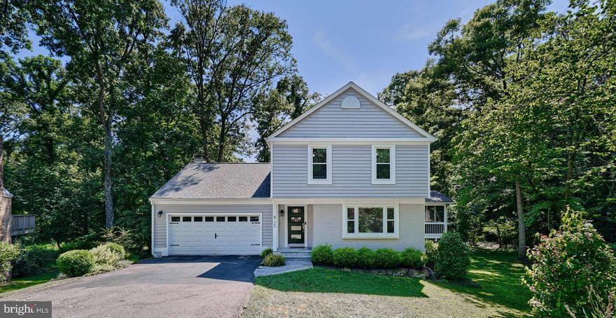 Welcome to this beautifully updated colonial nestled in the sought-after Shipleys Choice neighborhood, situated on a private cul-de-sac. This home is move-in ready, with no detail overlooked. Enjoy the stunning, newly updated hardwood flooring that runs throughout the home, a gorgeously renovated kitchen and bathrooms, newer HVAC system, and updated insulated siding, gutters, and windows. Unwind in the large screened-in porch or rear deck, overlooking the beautifully landscaped yard. Positioned on over 1/3 of an acre, this property backs onto a wooded lot, providing additional privacy. This smart home features a Nest wireless thermostat and a garage door opener. The community offers walking paths, a pool, tennis courts, and a tot lot. Welcome to your new home in Shipleys Choice! This one won't last long so see it today!