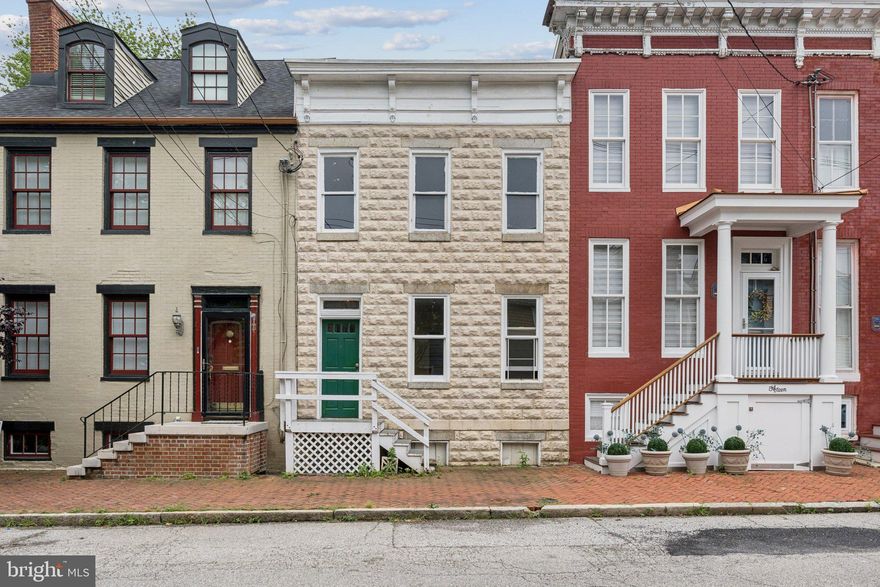 Amazing renovation opportunity in the heart of Annapolis, literally a stone's throw from the Naval Academy! 2 separate legal units, separately metered for gas and electric. Bring your architect and your contractor, as the potential is endless and exciting! Keep as two units or convert back to a spectacular single-family home. Major renovation is needed, but it is priced perfectly as the land alone is worth this rarely available price in a seldom available location. Tucked off of King George on the quiet street of College Ave, you will envision quiet evenings on the back patio looking out over your fully fenced yard and garden. Bring your vision and your dreams and make them both come true! Home is sold as-is, but was just recently occupied by 2 long-term tenants. Don't hesitate, homes rarely become available at this price in locations like this!!!